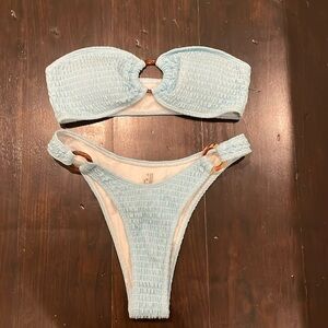 light blue bikini with cut outs on side
